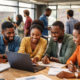 African entrepreneurs collaborating in a startup studio, turning innovative ideas into scalable businesses with support from venture builders and universities.