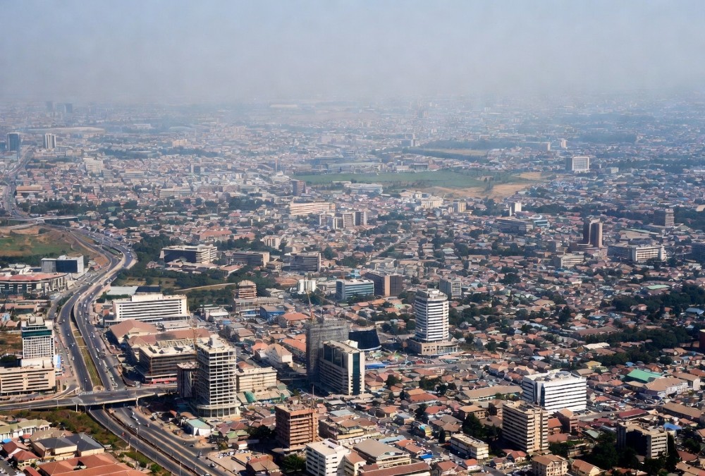 Aerial view of a fast-growing African city with dense urban development, symbolizing Africa's rapid population growth and demographic transformation