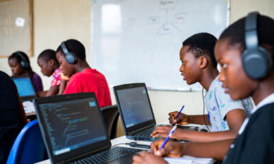 African youth learning coding and STEM skills in classroom