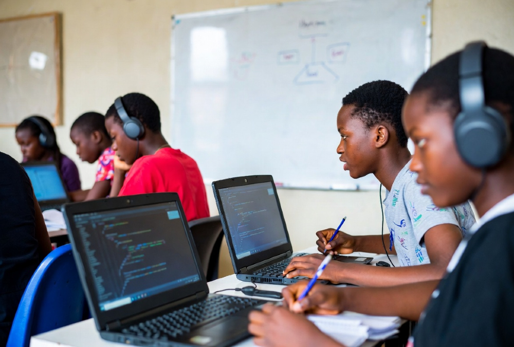 African youth learning coding and STEM skills in classroom