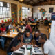 Vibrant co-working space in Nairobi showcasing African tech startups developing mobile-first fintech solutions for low-bandwidth environments