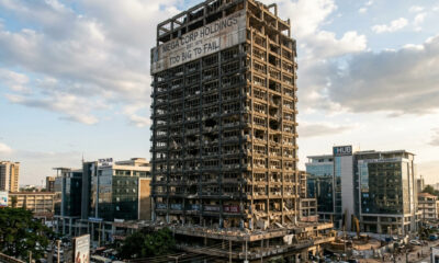 Crumbling corporate skyscraper symbolizing the decline of 'too big to fail' legacy institutions in a modern innovation-driven economy