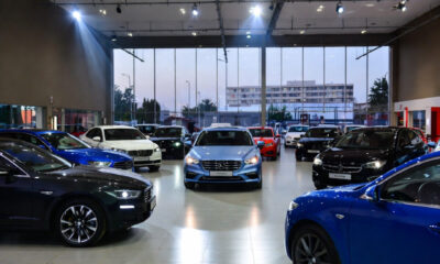 Modern car dealership showroom in Lagos, Nairobi, or Johannesburg reflecting brand-consistent customer experience