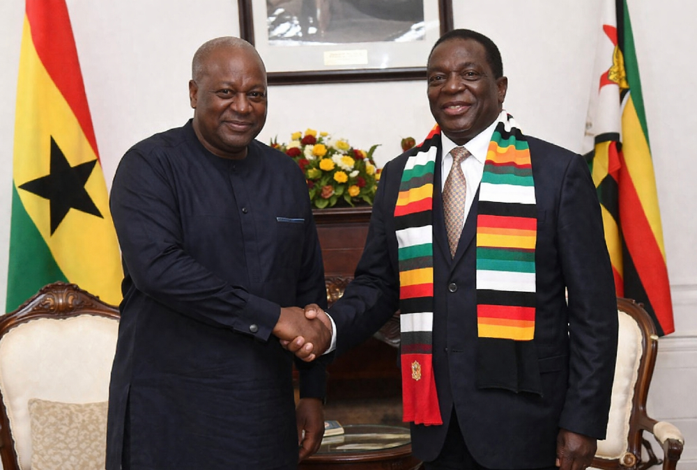 Ghana and Zimbabwe leaders shaking hands during state visit symbolizing bilateral trade partnership in Africa