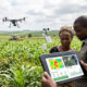 African farmers using artificial intelligence tools and data-driven technology to improve crop yields, predict weather patterns, and modernize agriculture across the continent amid rising food demand and climate challenges.