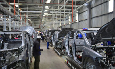 Vehicle assembly line at African automotive manufacturing plant under AfCFTA trade agreement