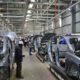 Vehicle assembly line at African automotive manufacturing plant under AfCFTA trade agreement