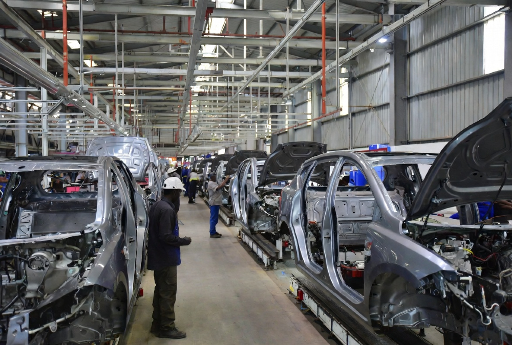 Vehicle assembly line at African automotive manufacturing plant under AfCFTA trade agreement