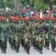 Chadian military troops march in formation during a deployment ceremony, representing Chad's 1,500-strong contingent committed to Haiti's Gang Suppression Force