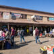 South African township street market with African migrant traders and vendors