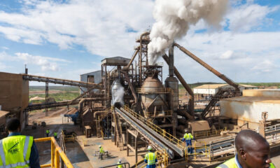 Southern Africa mining and processing facility with workers refining lithium and copper, symbolizing the region’s shift from raw mineral exports to local beneficiation, industrialization, renewable energy integration, and modern transport corridors.