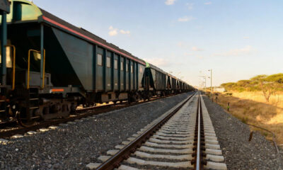 Freight train on East Africa's new standard gauge railway corridor, symbolizing integrated trade infrastructure and customs harmonization for seamless regional commerce.
