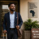 Professional African entrepreneur returning home to launch a startup, symbolizing reverse brain drain Africa