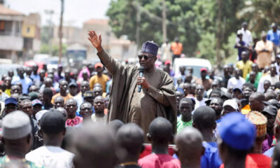 African leadership accountability: a leader addresses a crowd at a political rally, symbolizing the dangerous gap between performative leadership and genuine institutional governance in Africa.