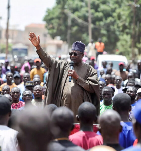 African leadership accountability: a leader addresses a crowd at a political rally, symbolizing the dangerous gap between performative leadership and genuine institutional governance in Africa.