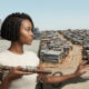 Conceptual illustration of South Africa’s unfinished post-apartheid transformation, highlighting the gap between political freedom and economic inclusion, township inequality, and access to land, capital, and opportunity.