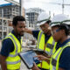 African engineers and developers building industrial infrastructure representing brainpower arbitrage investment opportunity