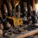 Traditional African artifacts representing the need to preserve African cultural continuity beyond mere decorative performance.