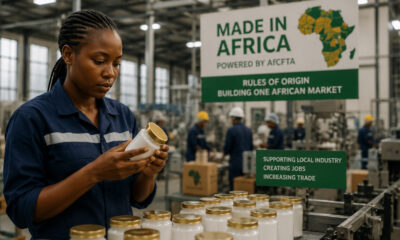 African factory worker inspecting locally manufactured goods, highlighting the "Made in Africa" initiative driven by AfCFTA Rules of Origin.