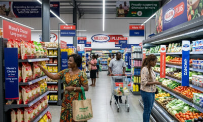 Shoppers in a modern African supermarket, highlighting the expansion of the largest retail chains in Africa.