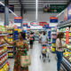 Shoppers in a modern African supermarket, highlighting the expansion of the largest retail chains in Africa.