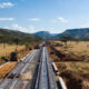Standard Gauge Railway construction Naivasha to Kampala Uganda, reducing Mombasa transit time from 7 days to 24 hours, $2.2 billion Yapi Merkezi contract 2026