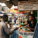 African startups innovating inside chaos - M-Pesa, Flutterwave, and M-KOPA solving real-world challenges in informal economies.