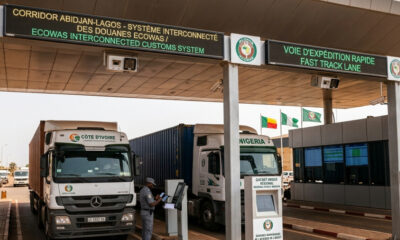 Digital trade infrastructure in West Africa showing interconnected customs systems and border crossing technology along the Abidjan-Lagos Corridor