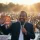 Ethiopian Prime Minister Abiy Ahmed addressing supporters after his party's landslide election victory, with the Nile River dispute and Horn of Africa tensions in the background.