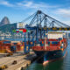 Brazilian port infrastructure with cargo containers representing expanding maritime logistics links between African ports and Brazil through BRICS cooperation for commodity and manufactured goods trade