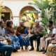 African community gathering reflecting relational identity, social cohesion, and civilizational wisdom.