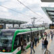 Addis Ababa Light Rail Transit train at modern station platform with commuters, Ethiopia's first electrified light rail system in Sub-Saharan Africa