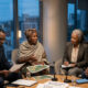 Diverse group of African bankers, farmers, and policymakers seated together at a roundtable discussion on agriculture financing gap solutions