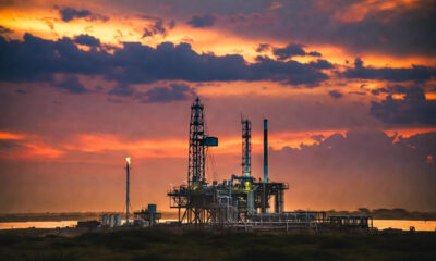 African oil rig and gas infrastructure at sunset, symbolizing Africa's $45 billion energy investment drive across oil, gas, and renewable power projects