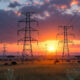 African power grid transmission lines at sunset symbolizing Africa's AI energy strategy and gigawatt-scale infrastructure powering the continent's AI economy