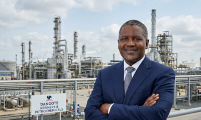 Aliko Dangote, chairman of Dangote Group, standing before the Dangote Refinery near Lagos, Nigeria, as part of the company's $100 billion expansion plan
