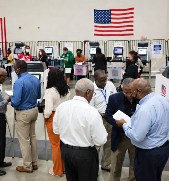African American voters casting ballots in past midterm elections amid the NAACP's voting rights mobilization.