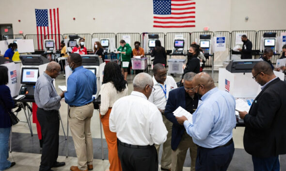 African American voters casting ballots in past midterm elections amid the NAACP's voting rights mobilization.