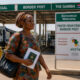 Woman entrepreneur crossing an African border post, illustrating the AfCFTA Protocol on Women and Youth in Trade