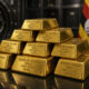 Gold bars representing Uganda's central bank strategy to build national reserves through domestic purchases from local miners rather than international markets