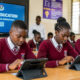 Kenyan students using digital tablets in a Smart Education program