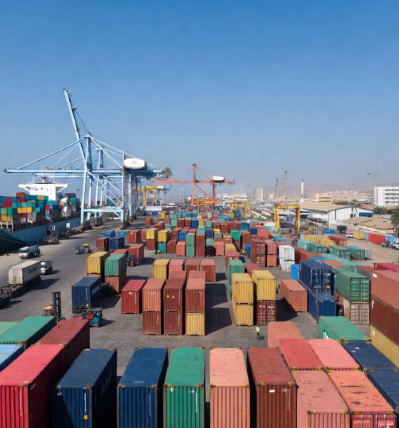 Shipping containers at an African port, representing the paradox where moving goods between neighboring African countries costs more than shipping from China.