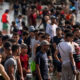 Migrants crossing the sea border into Ceuta, Spain during the 2026 migration crisis from Morocco