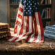 US flag and history books symbolizing the American culture war over historical remembrance and education