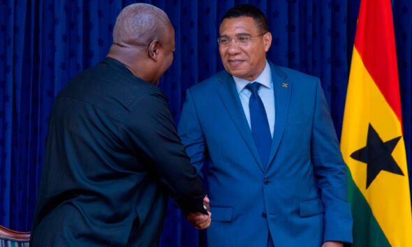Ghanaian President John Mahama and Jamaican Prime Minister Andrew Holness shake hands during state visit, announcing Africa-Caribbean free trade proposal and direct Accra-Montego Bay flights.