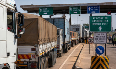 Trucks waiting at an African border crossing illustrating the infrastructure challenges facing AfCFTA implementation and continental free trade