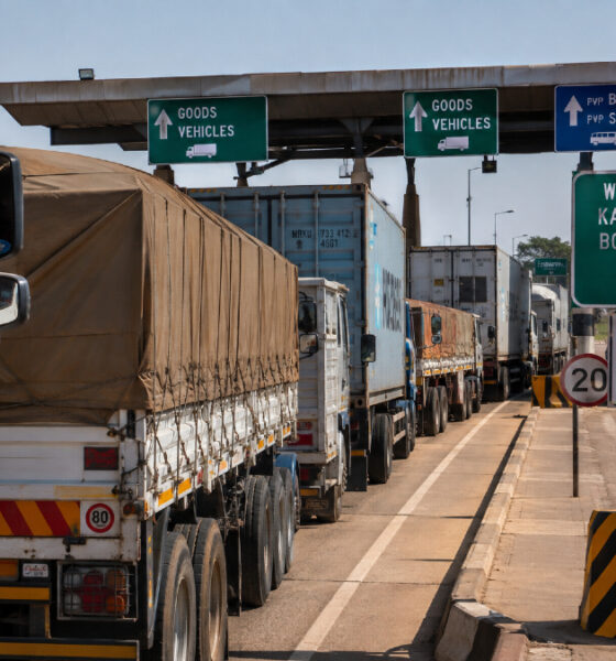 Trucks waiting at an African border crossing illustrating the infrastructure challenges facing AfCFTA implementation and continental free trade