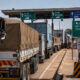 Trucks waiting at an African border crossing illustrating the infrastructure challenges facing AfCFTA implementation and continental free trade