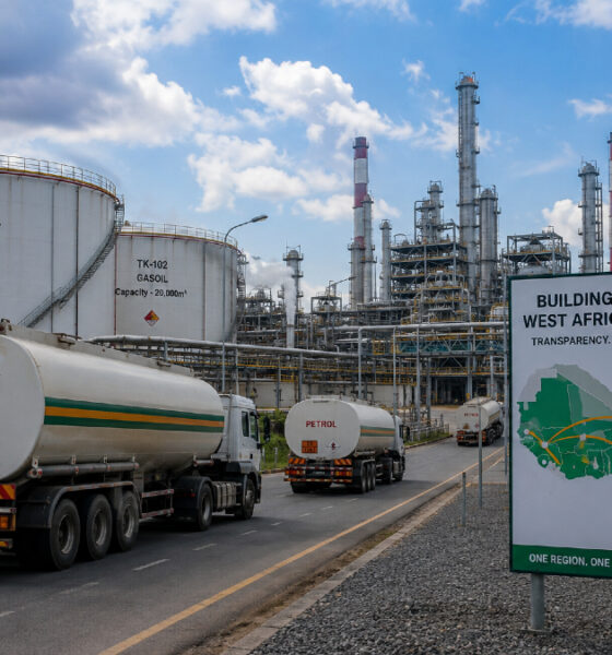 Fuel tanker trucks and refinery infrastructure symbolizing West Africa's regional fuel market and pricing benchmark integration