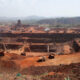 Open-pit copper and cobalt mine in the DRC, where foreign mining companies face a 10% local equity transfer deadline.